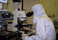 (Photo: "Operator at microscope". Licensed under Public domain via Wikimedia Commons)