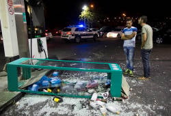 A gas station heavily damaged by Arab rioters