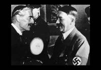 Hitler greets Neville Chamberlain (L) on his arrival in Munich, 29 September 1938. (Photo: United States Holocaust Memorial Museum)