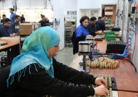 A Palestinian woman works at the Israeli SodaStream factory. (Photo by Nati Shohat/Flash90)