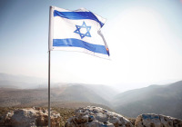 The Israeli flag seen in the Jordan Valley near Maale Efrayim. (Photo by Uri Lenz/Flash90)