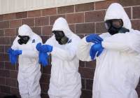 Suiting up before treating Ebola patients. (Photo: REUTERS/Rick Wilking)