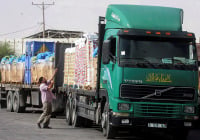 Trucks loaded with aid enter the Gaza Strip from Israel through the Kerem Shalom crossing on October 12, 2014. (Photo: Abed Rahim Khatib/Flash90)