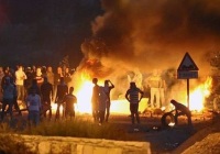 Arabs riot and throw rocks at Israeli Border Policemen at the entrance to the Arab village of Kafr Kana in northern Israel on November 9, 2014. (Photo: Flash90)