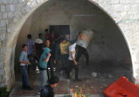 Arabs desecrate Joseph's Tomb in 2011. (Photo:   Issam Rimawi/Flash90)