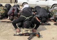 ISIS terrorists in prayer. (Photo: barnabasfund.org)