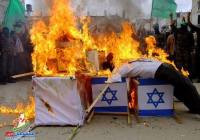 Hamas burns an effigy of a Jew in celebration. (Photo: IDF)