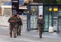 French security forces on patrol in Paris. (Photo: Kavalenkau/Shutterstock)