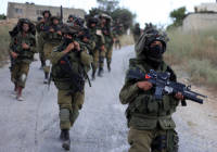 IDF soldiers patrol in Judea and Samaria. (Photo by Issam Rimawi/Flash 90)