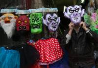 An Israeli man offers costumes before the upcoming Jewish holiday of Purim. (Nati Shohat/Flash 90)