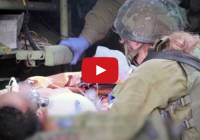 IDF assists wounded Syrian civilians. (Screenshot)