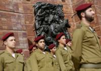 Israeli soldiers stand at attention