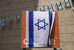 Israeli employees cover Orange logos