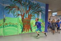 Children participate in an emergency drill.