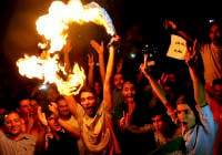 Iranians in Tehran celebrate signing of the nuclear deal in July. (Ebrahim Noroozi/AP)