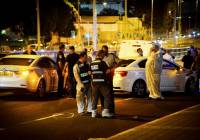 Security forces seen at the site of the Petah Tikva terror attack. (Flash90)