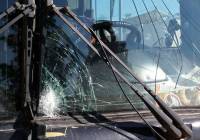 Shattered window of Breaking the Silence tour bus