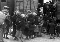 Jews board a train during the Holocaust.