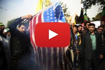 Iranian protesters burn an American flag during an anti-American rally in Tehran.