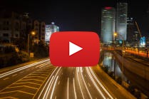 The Azrieli buildings seen over the Ayalon Highway and river at night in the city of Tel Aviv, on December 19, 2015.