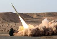 Iran's military launches a missile. (Fars News)