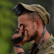 Israeli soldier praying