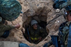 Israeli soldiers from the Givati brigade seen at the entrance to a terror tunnel. Even during a ceasefire, the IDF works to locate and destroy the tunnels. (Photo: IDF Spokesperson/FLASH90 