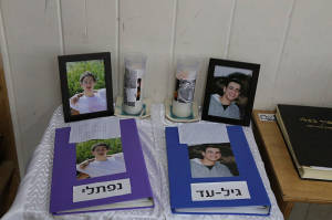 A memorial to Gilad Sha’ar and Naftali Frankel at the yeshiva they attended. (Photo: Gershon Elinson/Flash90)