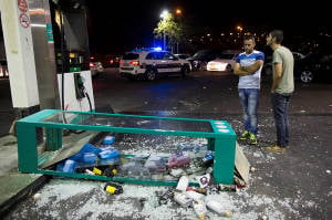 A gas station heavily damaged by Arab rioters