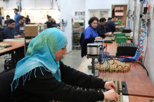 A Palestinian woman works at the Israeli SodaStream factory. (Nati Shohat/Flash90)