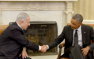 Los dos líderes mundiales se dan la mano en la Casa Blanca el 1 de octubre de 2014 (Foto: Avi Ohayon / GPO)