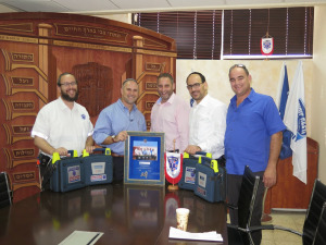 Executive Director of United with Israel poses with United Hatzolah staff