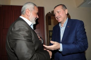 Hamas leader Haniyeh (L) and Turkish Prime Minister Erdogan in Nov. 2014. (Photo: Mohammed Al-Ostaz/Flash90) 