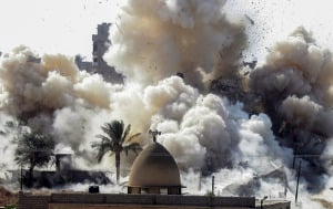 Smoke rises after a house was blown up during a military operation by Egyptian security forces in the Egyptian city of Rafah near the border with southern Gaza Strip on October 29, 2014. (Photo: Abed Rahim Khatib/Flash90)