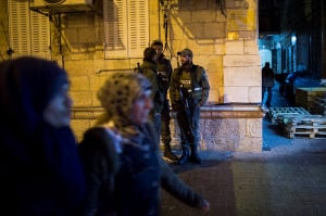 Police at the scene where a Jewish man was stabbed by an Arab terrorist on Nov. 16, 2014. (Photo: Yonatan Sindel/Flash90)