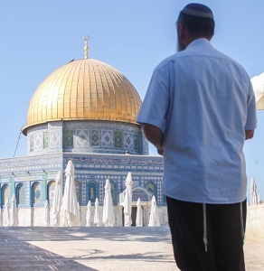 A Jew stands on the Temple Mount. 