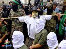Hamas parades with an effigy of a Jew before burning it. (Photo: IDF)