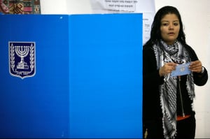 An Arab Israeli woman casts her vote during the 2009 elections. (Photo: Nati Shohat / Flash90)