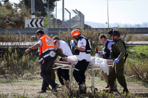 The wounded terrorist evacuated by Israeli medical teams.  (Photo: Gershon Elinson/Flash90)