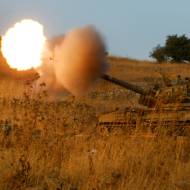 An Israeli mobile artillery piece fires a shell. (Olivier Fitoussi/Flash 90)