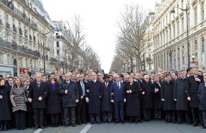 PM Netanyahu (front row, 7th from left), joins hands with world leaders as they attend a solidarity march .(Flash 90)