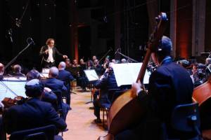  Jerusalem Symphony Orchestra with its director, Maestro Frédéric Chaslin. (Photo: Sasson Tiram via Tazpit News Agency)