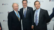 L-R: Joe Lieberman, Mitt Romney, and Adam Milstein in 2014.