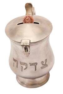 A traditional Jewish tzedaka container for giving charity. (Rhonda Roth/Shutterstock)