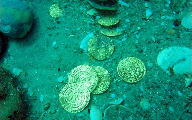 Coins as found on the seabed at Caesarea National Park