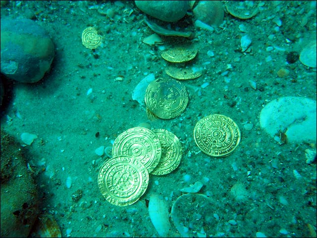 Coins as found on the seabed at Caesarea National Park