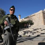 An Israeli soldier stands guard outside the Cave of the Patriarchs in Hebron. (Nati Shohat/ Flash90)