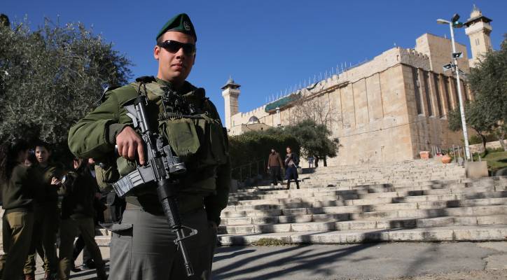 IDF soldier stands guard in Hebron