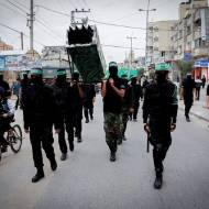 Palestinians march with rockets in Gaza. (Abed Rahim Khatib / Flash90)