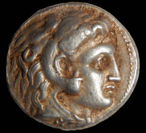 Silver coin of Alexander the Great found in the cave.